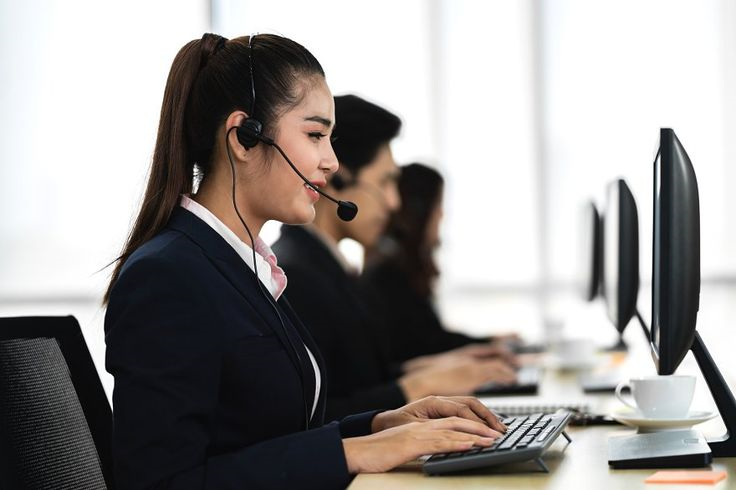 Group of happy asian smiling call center business operator custo