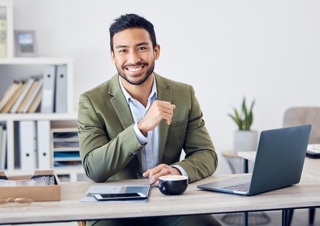 Premium Photo _ Business is my game_ Cropped portrait of a handsome young businessman working at his desk in the office_